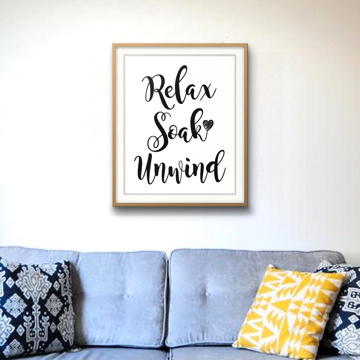 Relax, Soak, Unwind shown framed on a wall