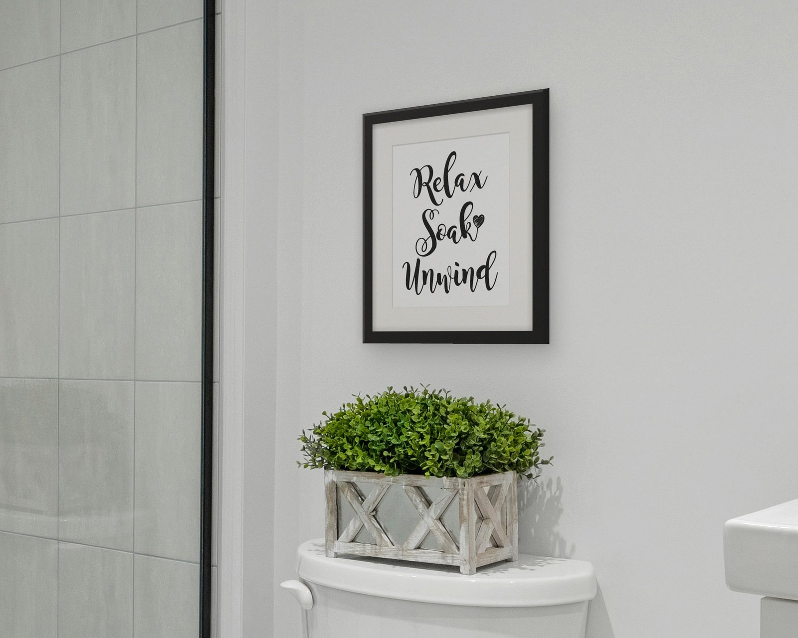 Relax, Soak, Unwind, Framed in a bathroom