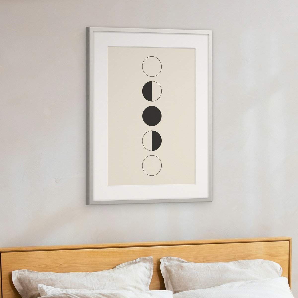 Moon Phases shown framed on a wall