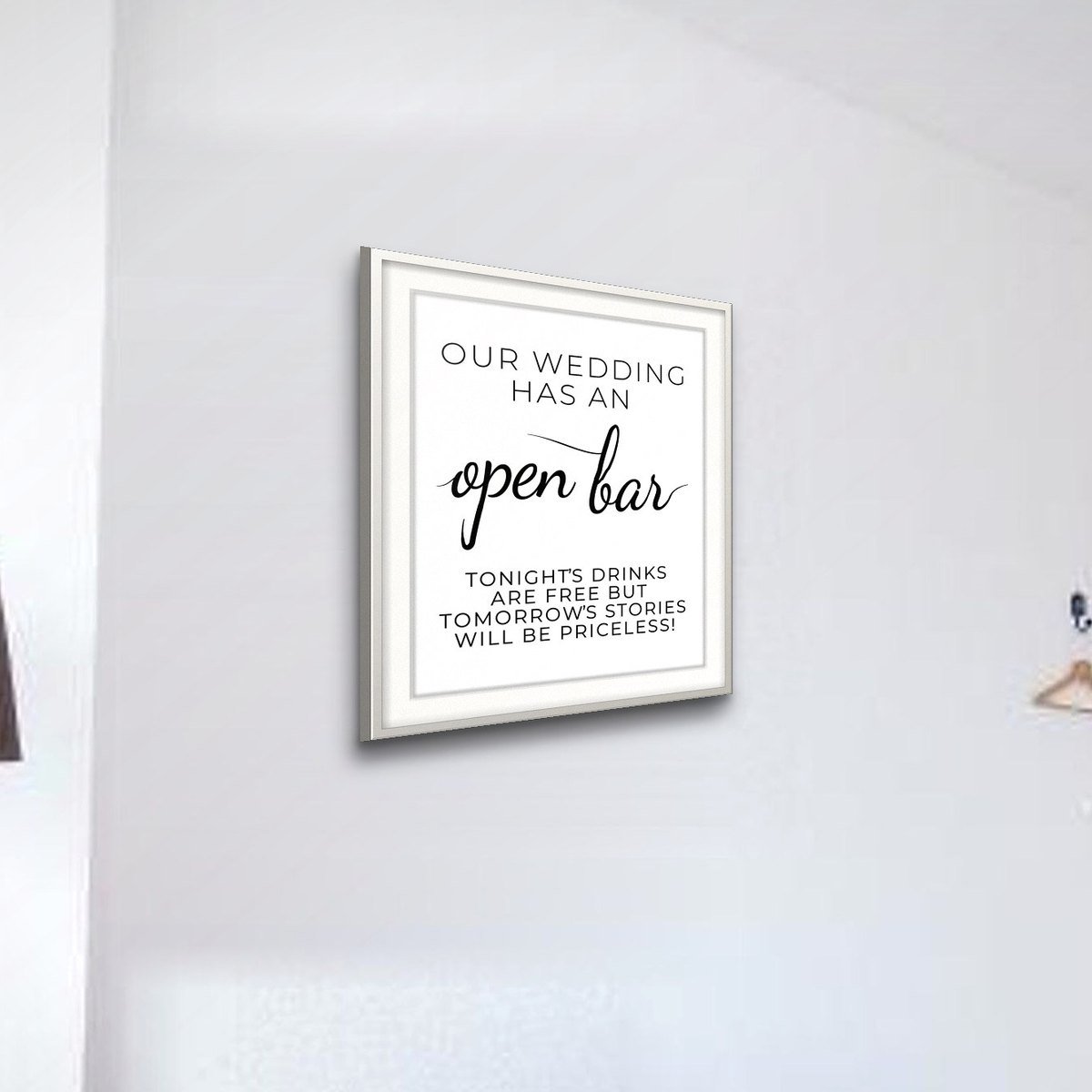 Our Wedding Has An Open Bar shown framed on a wall