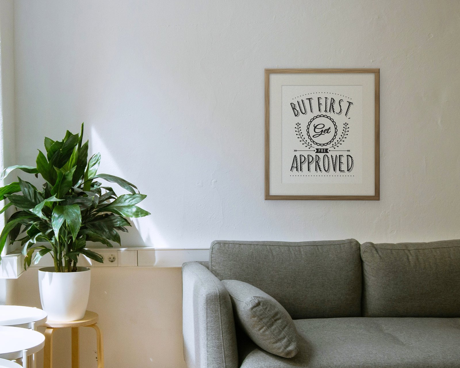 But First, Get Pre Approved, Framed in a living room