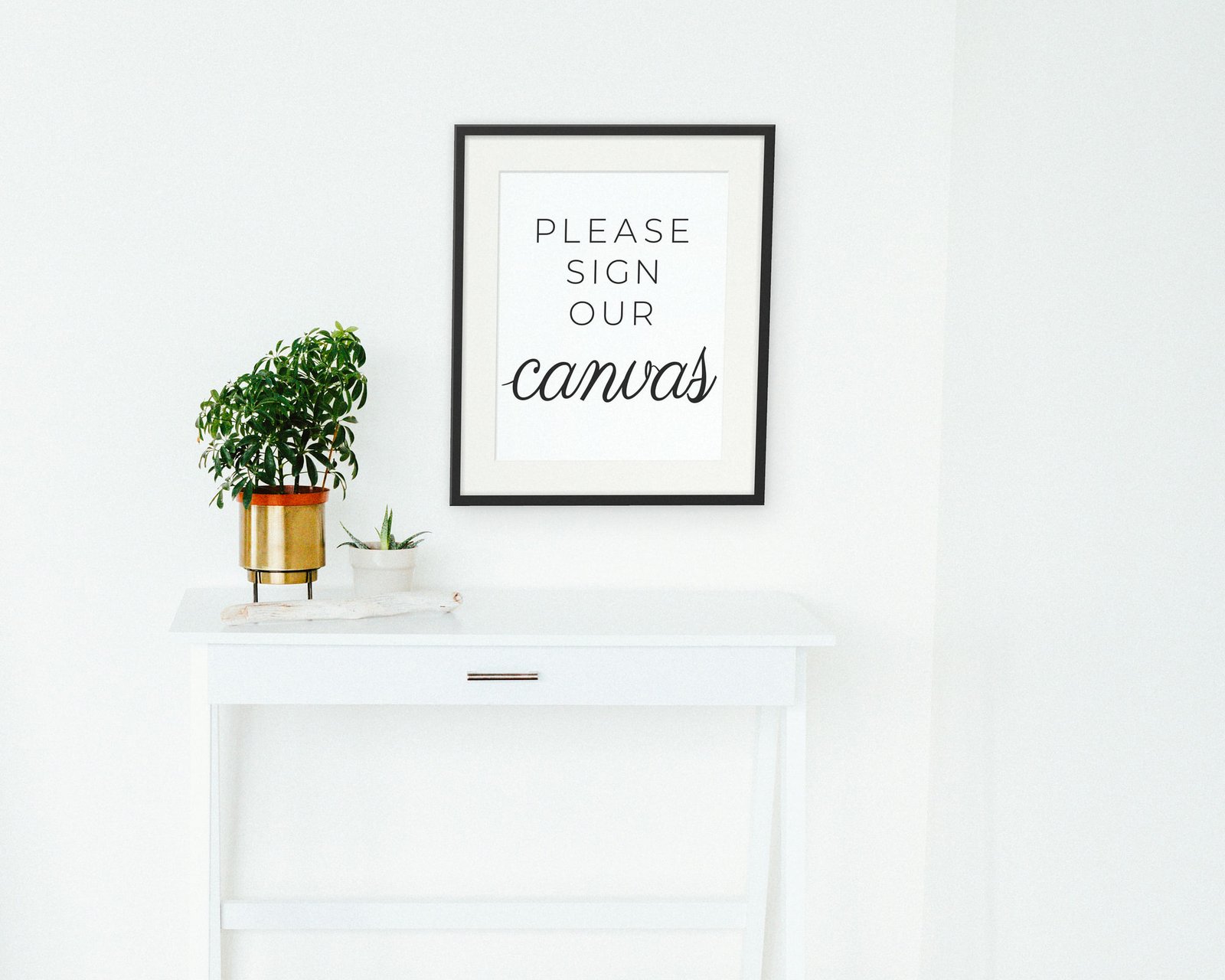 Please Sign Our Canvas, Framed in a hallway and entry
