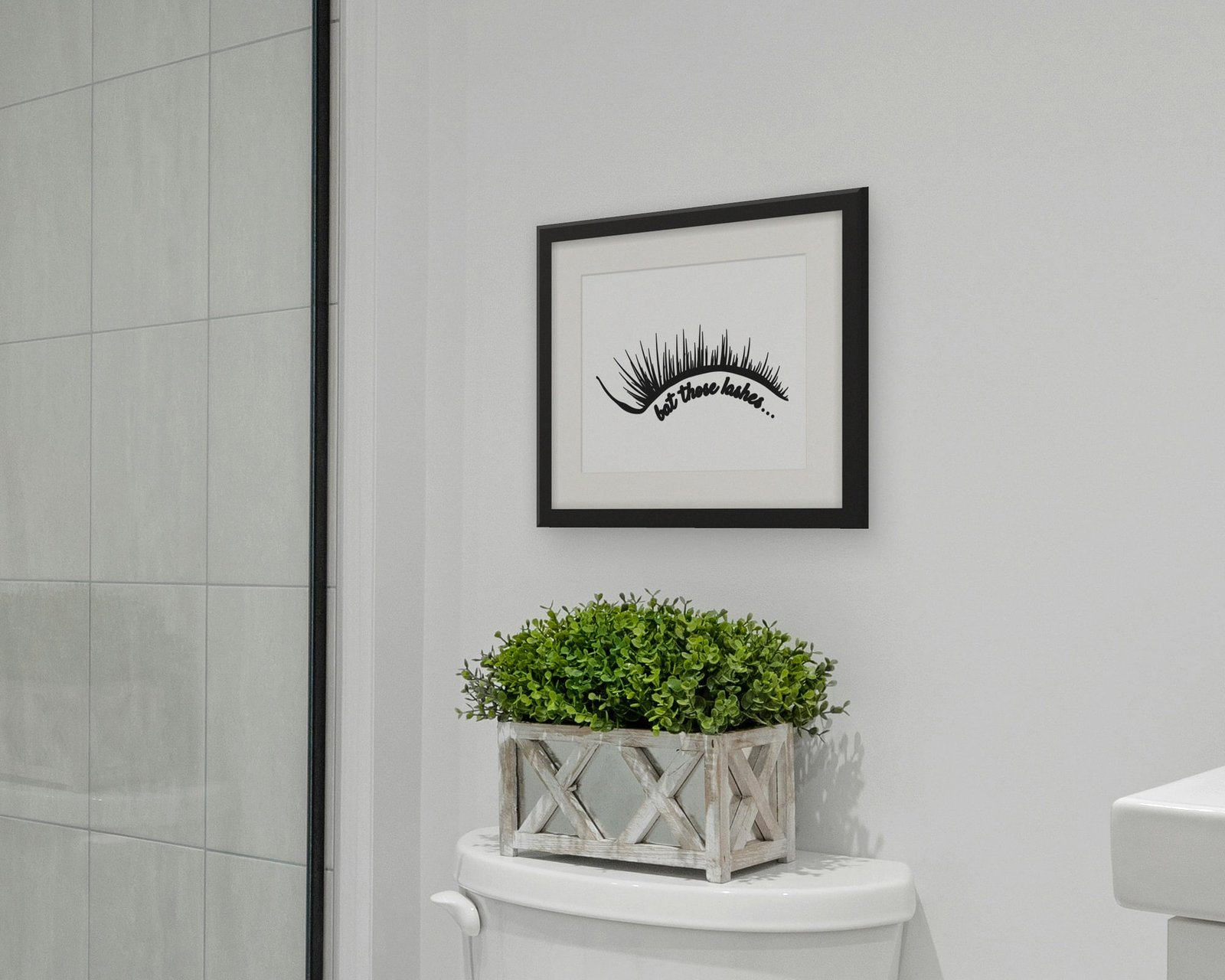 Bat Those Lashes, Framed in a bathroom
