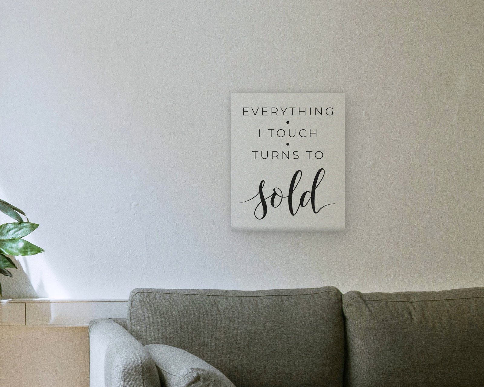 Everything I Touch Turns To Sold, Gallery canvas in a living room